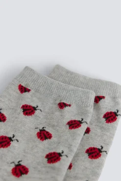 Chaussette longue &agrave; coccinelles