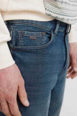 Jeans en knit denim surteint coupe slim