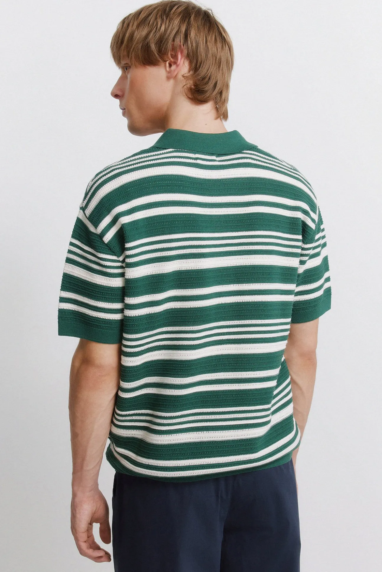 Polo en maille structurée à rayures