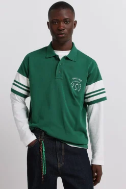 Polo en piqu&eacute; &agrave; manches &agrave; blocs de couleur contrastants coupe droite