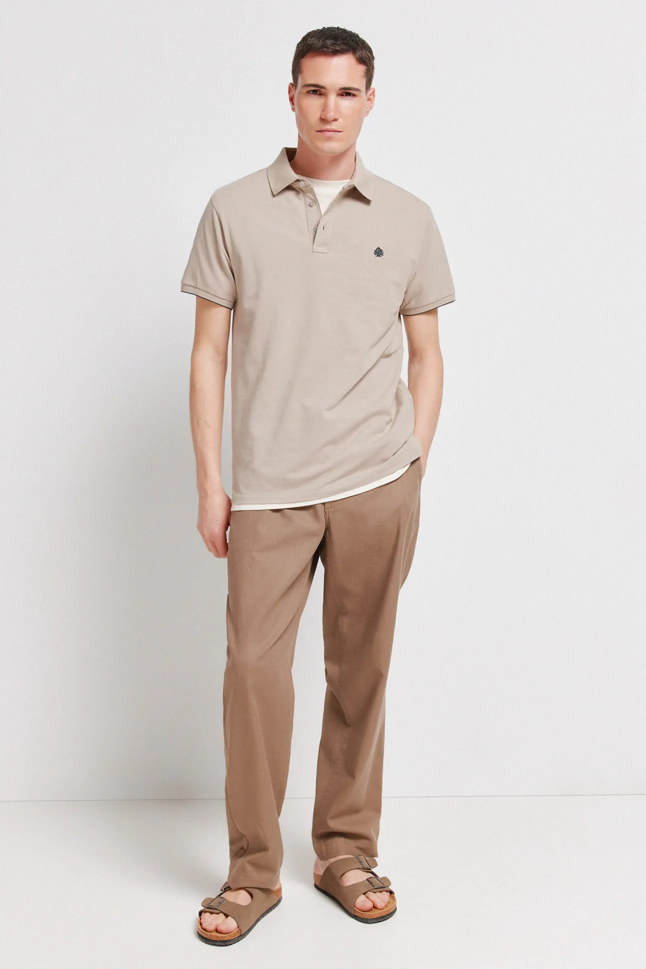 Polo en piqué coupe slim à poignets contrastants