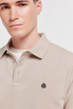 Polo en piqué coupe slim à poignets contrastants
