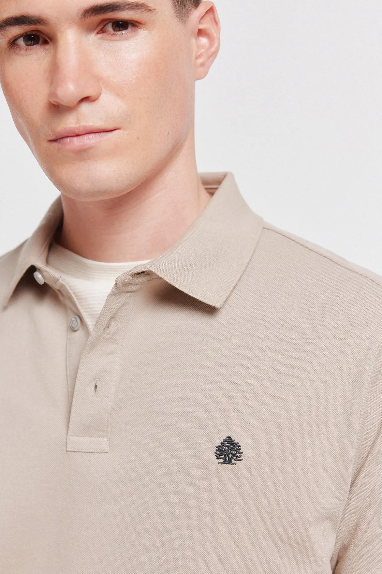 Polo en piqué coupe slim à poignets contrastants
