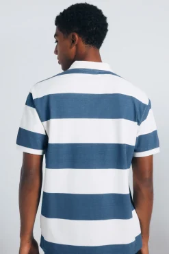 Polo piqu&eacute; coupe classique &agrave; larges rayures