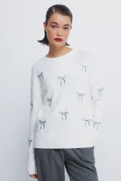 Pull avec nœuds à paillettes